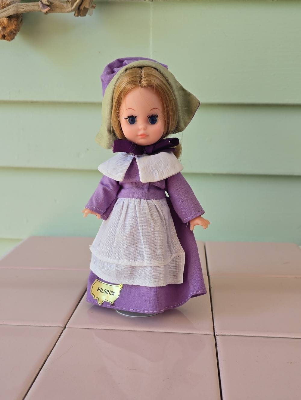 Purple Pilgrim Dress Doll with White Apron and Green Bonnet